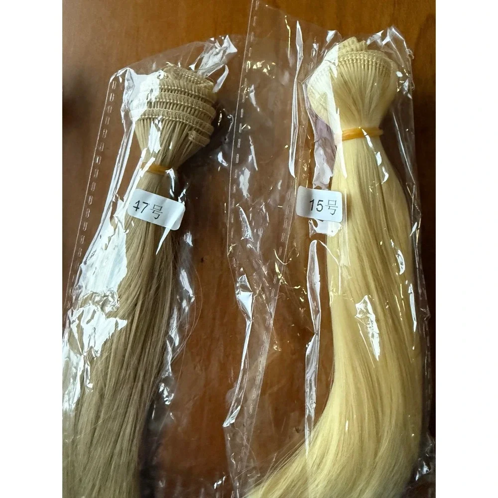 Doll hair wefts. Lot of 13